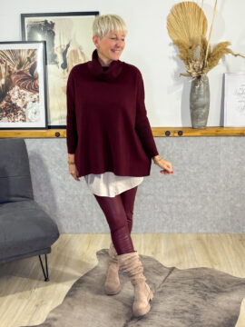 Fake-Bluse mit Gummibund, Knopfleiste und abgerundetem Saum. Als Verlängerung für kurze Pullover oder zum "aufpeppen" von einfachen Oberteilen.